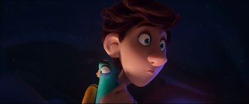 Movie still from “Spies in Disguise” (2019), directed by Troy Quane – A person with a bird on their shoulder; Close Up shot, Over the shoulder angle