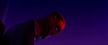 Movie still from “Spies in Disguise” (2019), directed by Troy Quane – A man with his head tilted to the side; Close Up shot, Low angle