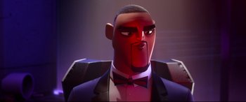 Movie still from “Spies in Disguise” (2019), directed by Troy Quane – A man in a suit and bow tie; Close Up shot, Low angle