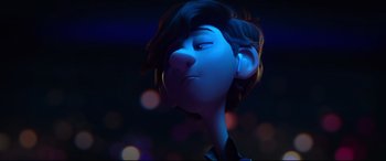 Movie still from “Spies in Disguise” (2019), directed by Troy Quane – A person's face in the dark; Close Up shot, Over the shoulder angle