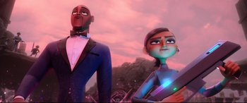 Movie still from “Spies in Disguise” (2019), directed by Troy Quane – Two animated characters standing next to each other; Medium shot, Low angle