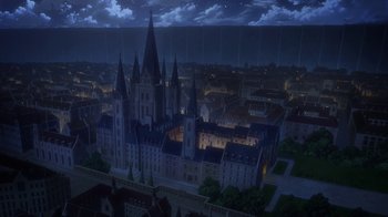 Movie still from “Attack on Titan” (2013), directed by Masashi Koizuka – An aerial view of a city at night with lights; Extreme Wide shot, Low angle