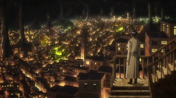 Movie still from “Attack on Titan” (2013), directed by Masashi Koizuka – A man standing on top of steps looking over a city at night; Extreme Wide shot, High angle