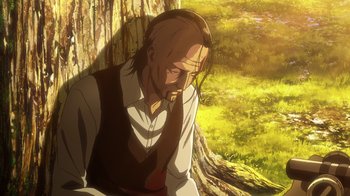 Movie still from “Attack on Titan” (2013), directed by Masashi Koizuka – A man sitting next to a tree in a field; Medium shot, Low angle