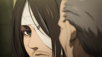 Movie still from “Attack on Titan” (2013), directed by Masashi Koizuka – A man's face with long black hair; Extreme Close Up shot, Over the shoulder angle