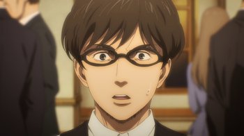 Movie still from “Attack on Titan” (2013), directed by Masashi Koizuka – An animated picture of a man with glasses; Close Up shot, Low angle