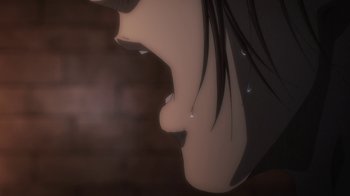 Movie still from “Attack on Titan” (2013), directed by Masashi Koizuka – A woman's face in a dark room; Extreme Close Up shot, Low angle