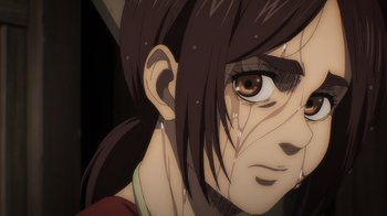 Movie still from “Attack on Titan” (2013), directed by Masashi Koizuka – A person's face with a dark background; Close Up shot, High angle