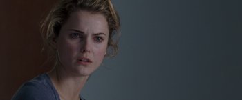 Movie still from “August Rush” (2007), directed by Kirsten Sheridan – A person wearing a dress shirt; Close Up shot, Over the shoulder angle