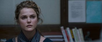 Movie still from “August Rush” (2007), directed by Kirsten Sheridan – A person wearing a blue shirt; Close Up shot, Over the shoulder angle