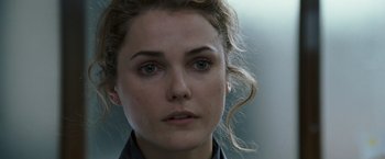 Movie still from “August Rush” (2007), directed by Kirsten Sheridan – A woman's face in a black shirt; Close Up shot, Over the shoulder angle