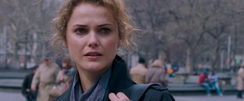 Movie still from “August Rush” (2007), directed by Kirsten Sheridan – A person wearing a jacket; Close Up shot, Over the shoulder angle