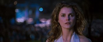 Movie still from “August Rush” (2007), directed by Kirsten Sheridan – A person looking at the camera; Close Up shot, Over the shoulder angle