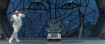Movie still from “Austin Powers in Goldmember” (2002), directed by Jay Roach – A chair in front of a wall with eyes on it; Extreme Close Up shot, High angle