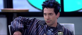 Movie still from “Austin Powers: The Spy Who Shagged Me” (1999), directed by Jay Roach – A person wearing a jacket; Close Up shot, High angle