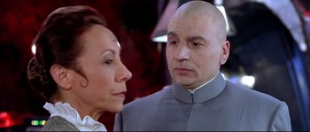 Movie still from “Austin Powers: The Spy Who Shagged Me” (1999), directed by Jay Roach – A man and a woman looking at each other; Close Up shot, Over the shoulder angle