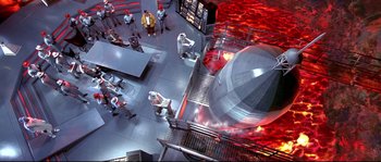 Movie still from “Austin Powers: The Spy Who Shagged Me” (1999), directed by Jay Roach – A group of people standing in a room; Extreme Wide shot, High angle