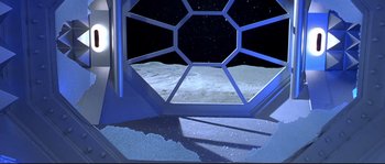 Movie still from “Austin Powers: The Spy Who Shagged Me” (1999), directed by Jay Roach – An image of an open door to the moon; Wide shot, High angle