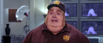 Movie still from “Austin Powers: The Spy Who Shagged Me” (1999), directed by Jay Roach – An older man with a beard and a hat on; Close Up shot, High angle