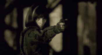 Movie still from “Avalon” (2001), directed by Mamoru Oshii – A woman is holding a gun in her hand; Close Up shot, Over the shoulder angle
