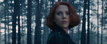 Movie still from “Avengers: Age of Ultron” (2015), directed by Joss Whedon – A person with short hair; Close Up shot, Over the shoulder angle