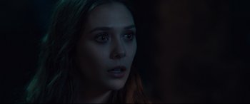 Movie still from “Avengers: Age of Ultron” (2015), directed by Joss Whedon – A person with red eyes; Close Up shot, Over the shoulder angle