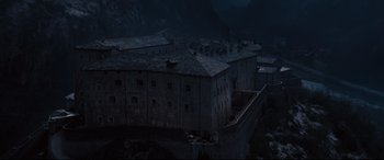 Movie still from “Avengers: Age of Ultron” (2015), directed by Joss Whedon – An old building in the middle of the night; Extreme Wide shot, High angle