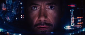 Movie still from “Avengers: Age of Ultron” (2015), directed by Joss Whedon – A man's face in the dark; Extreme Close Up shot, Overhead angle