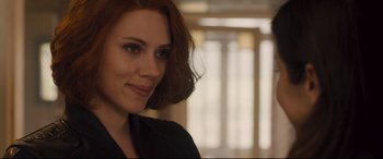 Movie still from “Avengers: Age of Ultron” (2015), directed by Joss Whedon – A person with red hair; Close Up shot, Over the shoulder angle
