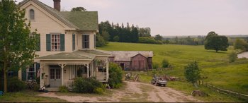 Movie still from “Avengers: Age of Ultron” (2015), directed by Joss Whedon – An old farm house and barn in the middle of a field; Extreme Wide shot, High angle