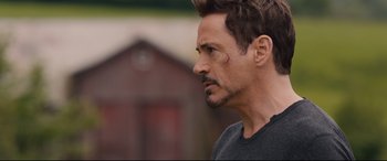 Movie still from “Avengers: Age of Ultron” (2015), directed by Joss Whedon – A person with a beard; Close Up shot, Over the shoulder angle