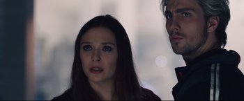 Movie still from “Avengers: Age of Ultron” (2015), directed by Joss Whedon – A woman and a man standing next to each other; Close Up shot, Low angle