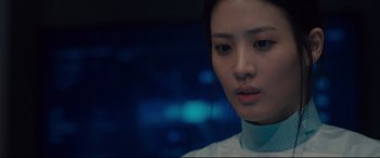 Movie still from “Avengers: Age of Ultron” (2015), directed by Joss Whedon – A person wearing a white shirt; Close Up shot, Over the shoulder angle