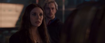 Movie still from “Avengers: Age of Ultron” (2015), directed by Joss Whedon – A woman standing next to a man in front of a mirror; Close Up shot, Over the shoulder angle