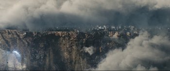 Movie still from “Avengers: Age of Ultron” (2015), directed by Joss Whedon – A view of a city from a mountain side; Extreme Wide shot, Overhead angle