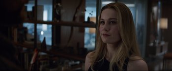 Movie still from “Avengers: Endgame” (2019), directed by Anthony Russo – A beautiful young lady sitting in front of a window; Close Up shot, Over the shoulder angle