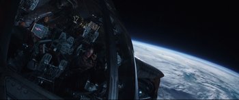 Movie still from “Avengers: Endgame” (2019), directed by Anthony Russo – A person is taking a picture of the earth from a space ship; Extreme Wide shot, Overhead angle