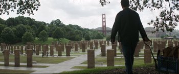 Movie still from “Avengers: Endgame” (2019), directed by Anthony Russo – A man is walking through a field of concrete markers; Extreme Wide shot, Over the shoulder angle