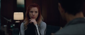 Movie still from “Avengers: Endgame” (2019), directed by Anthony Russo – A woman sitting in front of a mirror with her hand on her chin; Close Up shot, Over the shoulder angle