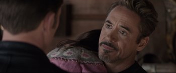 Movie still from “Avengers: Endgame” (2019), directed by Anthony Russo – A person with a beard and mustache; Close Up shot, Over the shoulder angle