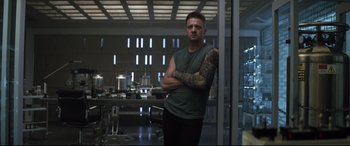 Movie still from “Avengers: Endgame” (2019), directed by Anthony Russo – A man standing with his arms crossed in a kitchen; Medium shot, Low angle