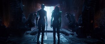 Movie still from “Avengers: Endgame” (2019), directed by Anthony Russo – A couple of women standing next to each other in a building; Wide shot, Low angle