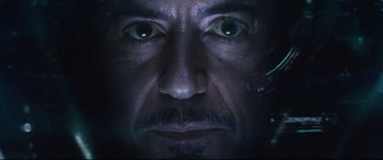 Movie still from “Avengers: Endgame” (2019), directed by Anthony Russo – A man's face with eyes glowing; Extreme Close Up shot, Overhead angle