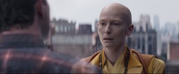 Movie still from “Avengers: Endgame” (2019), directed by Anthony Russo – A man with bald head wearing a yellow shirt; Close Up shot, Over the shoulder angle