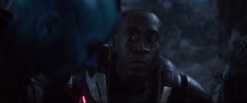 Movie still from “Avengers: Endgame” (2019), directed by Anthony Russo – A person wearing a helmet; Close Up shot, Over the shoulder angle