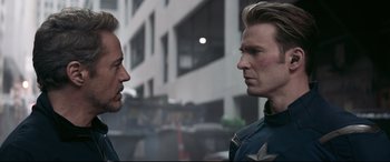 Movie still from “Avengers: Endgame” (2019), directed by Anthony Russo – Two men are facing each other in a city; Close Up shot, Over the shoulder angle