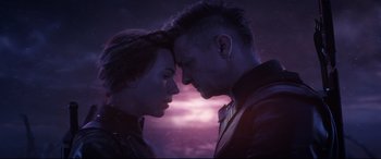 Movie still from “Avengers: Endgame” (2019), directed by Anthony Russo – A man and a woman face to face in front of a purple sky; Close Up shot, Low angle