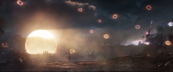Movie still from “Avengers: Endgame” (2019), directed by Anthony Russo – A man standing in the middle of a field; Extreme Wide shot, Low angle
