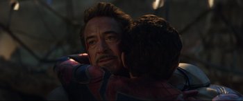 Movie still from “Avengers: Endgame” (2019), directed by Anthony Russo – A person hugging a person; Close Up shot, Over the shoulder angle