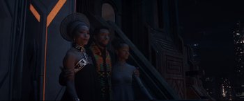 Movie still from “Avengers: Endgame” (2019), directed by Anthony Russo – A group of people standing next to each other on stairs; Medium shot, Low angle